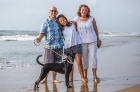 Rob, Maya and Flor Marting with their dog, Luna, at Pallavakkam Beach, near their former home in Chennai, India, where he taught at the American International School Chennai for six years. April 2018. (Photo/Melissa Freitas).