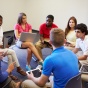 students in a group discussion. 