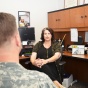 Counselor speaking with an army veteran. 