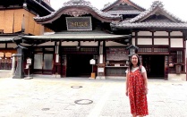 Otsuki stands in front of the Dogo Onsen hot spring, Matsuyama, Japan, June 15, 2018. 