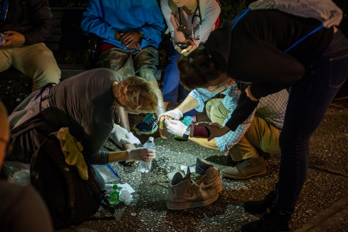 Student volunteers from UB HEALS offer some much-needed foot care to Buffalo's homeless population in this photo from 2016. Photo: Douglas Levere.