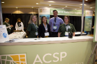 Student Volunteers at the local host welcome desk. Photo by Maryanne Schultz