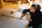 Before joining SACRA, a screwdriver was the only tool Donna Neiberline knew how to use. "I've learned something new here pretty much every day," she says. Photo: Douglas Levere