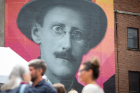 UB held a news conference on June 14 to introduce a new mural of renowned author and poet James Joyce in downtown Buffalo. Photographer: Meredith Forrest Kulwicki