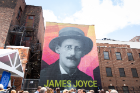 UB held a news conference on June 14 to introduce a new mural of renowned author and poet James Joyce in downtown Buffalo. Photographer: Meredith Forrest Kulwicki