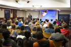 Scott Weber (rear left), vice president for student life, welcomes audience members to the debate. Photo: Douglas Levere