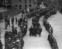 University of Buffalo Council Chair Walter P. Cooke (left), Chancellor Samuel P. Capen (center) and Chief Marshall Thomas F. Cooke (right) lead the academic procession marching across campus to the dedication of Foster Hall on Oct. 27, 1922.