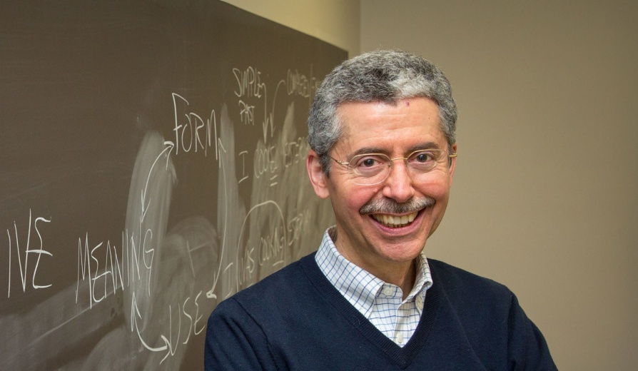 Portrait of Timothy Cauller, of the English Language Institute, in a Baldy Hall classroom. 