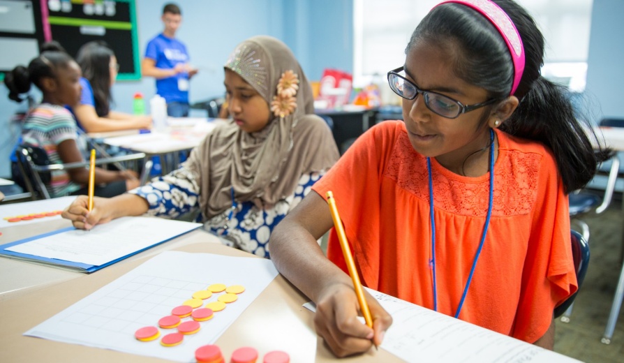 Students in the UB Summer Math Prorgam complete an activity session on July 20, 2017. The program was held at the Buffalo Academy of Science in downtown Buffalo. Photographer: Meredith Forrest Kulwicki. 