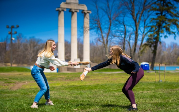 The French Club wrapped up the school year of activities with a "French Olympics" event in April 2022. The group met near Baird Point to test their fencing skills with baguettes, and played some "brioche dodgeball." Photographer: Douglas Levere. 