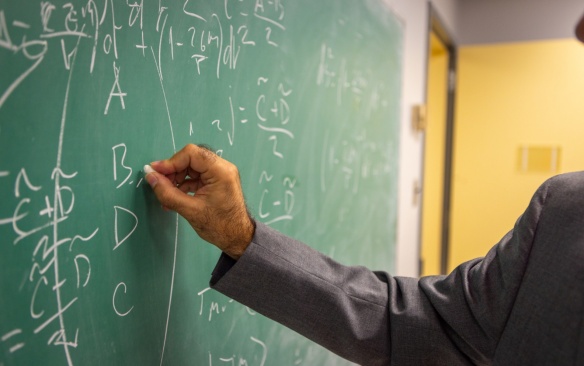 A portrait of Dejan Stojkovic, with the department of physics, taken in a lab in Fronczak Hall in November 2023. Photographer: Douglas Levere. 