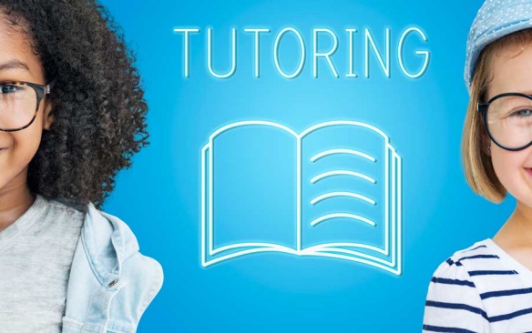 Two children with the word Tutoring between them. 