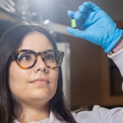 University at Buffalo PhD student Karla Ríos-Bonilla (in photo) and Diana Aga, director of the UB RENEW Institute, are authors on a study that assessed the mixture toxicity of per- and polyfluoroalkyl substances (PFAS), also known as forever chemicals. There were photographed in Aga’s research lab space in the Natural Sciences Complex in September 2024. 