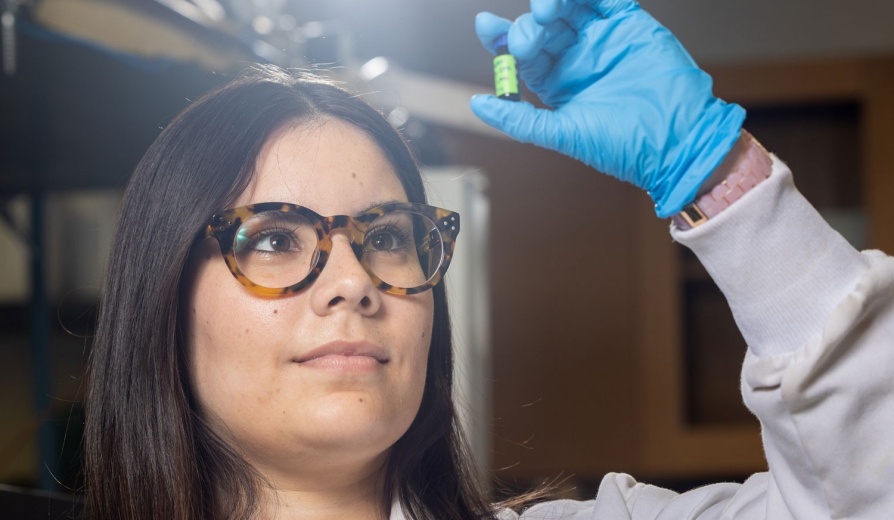 University at Buffalo PhD student Karla Ríos-Bonilla (in photo) and Diana Aga, director of the UB RENEW Institute, are authors on a study that assessed the mixture toxicity of per- and polyfluoroalkyl substances (PFAS), also known as forever chemicals. There were photographed in Aga’s research lab space in the Natural Sciences Complex in September 2024. 