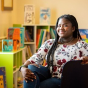 Female students sitting in an early education library. 