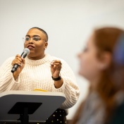 PhD student Dawnavyn James holds a workshop in Clemens Hall in December 2023. The workshop was centered around her book "Beyond February: Teaching Black History Any Day, Every Day, and All Year Long," a guide for elementary school teachers — and those studying to be teachers. Photographer: Meredith Forrest Kulwicki. 