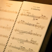 Sheet music on a music stand. 