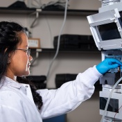 G. Ekin Atilla-Gokcumen, with the department of chemistry, is photographed in her research lab with students in September 2023 in the Natural Sciences Complex. A recent study from the lab revealed the mechanism behind an explosive form of cell death known as necroptosis and how to minimize it. Photographer: Meredith Forrest Kulwicki. 