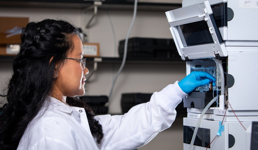 G. Ekin Atilla-Gokcumen, with the department of chemistry, is photographed in her research lab with students in September 2023 in the Natural Sciences Complex. A recent study from the lab revealed the mechanism behind an explosive form of cell death known as necroptosis and how to minimize it. Photographer: Meredith Forrest Kulwicki. 