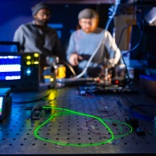 Tim Thomay, with physics, works with a student in his lab in Fronczak Hall in November 2023. Photographer: Douglas Levere. 