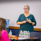 Doctoral students in counseling psychology participating in a small group seminar at the University at Buffalo Graduate School of Education with Dr. Amy Reynolds. 