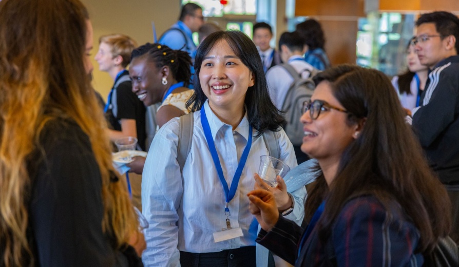 Smiling group of diverse female graduate students. 