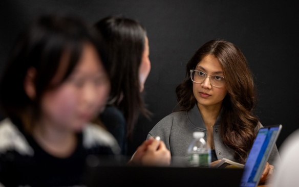 Students in deep discussion. 