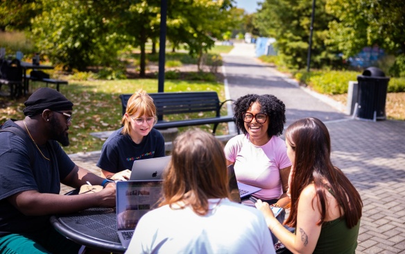 Students meting outside of Foster Hall on UB's South Campus. 