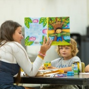 GSE students tutor local K-12 students in reading. 