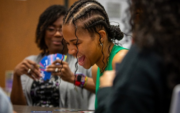 College student laughing. 