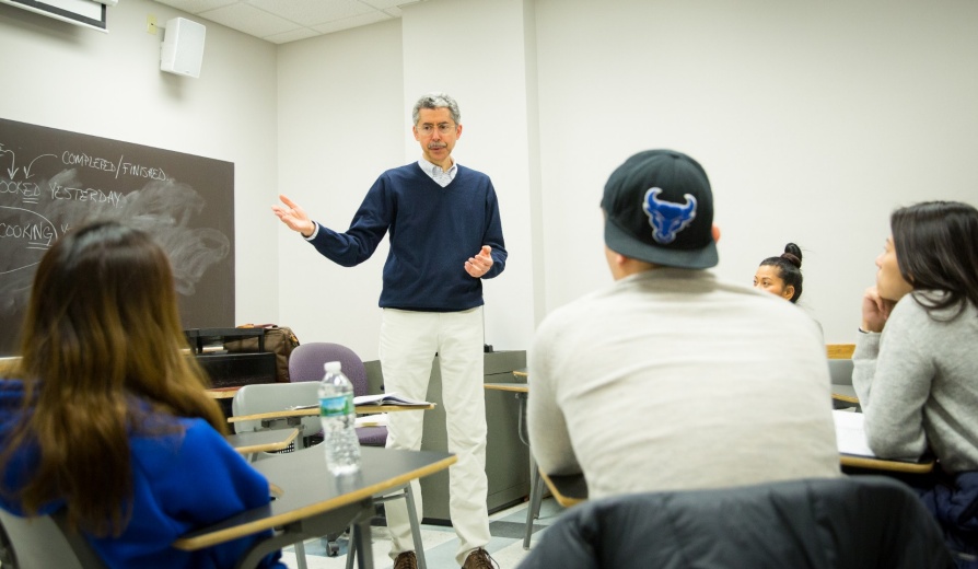 Timothy Cauller, of the English Language Institute teaches a class in Baldy Hall. Photographer: Meredith Forrest Kulwicki. 