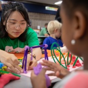 The UB Regional Institute and students from the School of Architecture and Planning guided children through a fun, hands-on activity aimed at soliciting ideas for the Play Garden in Ralph C. Wilson, Jr. Centennial Park at the Imagine LaSalle public workshop. Photographer: Meredith Forrest Kulwicki. 