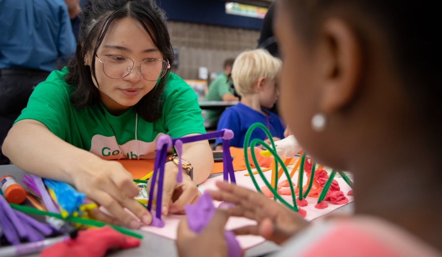 The UB Regional Institute and students from the School of Architecture and Planning guided children through a fun, hands-on activity aimed at soliciting ideas for the Play Garden in Ralph C. Wilson, Jr. Centennial Park at the Imagine LaSalle public workshop. Photographer: Meredith Forrest Kulwicki. 