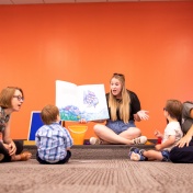 UB’s Graduate School of Education has partnered with GiGi’s Playhouse Down Syndrome Achievement Center of Buffalo to provide UB students with in-classroom experience teaching students with disabilities. UB students were photographed at the center working with clients in July 2021. GSE professor Claire Cameron is working with the program. Photographer: Meredith Forrest Kulwicki. 