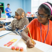 Students in the UB Summer Math Prorgam complete an activity session on July 20, 2017. The program was held at the Buffalo Academy of Science in downtown Buffalo. Photographer: Meredith Forrest Kulwicki. 