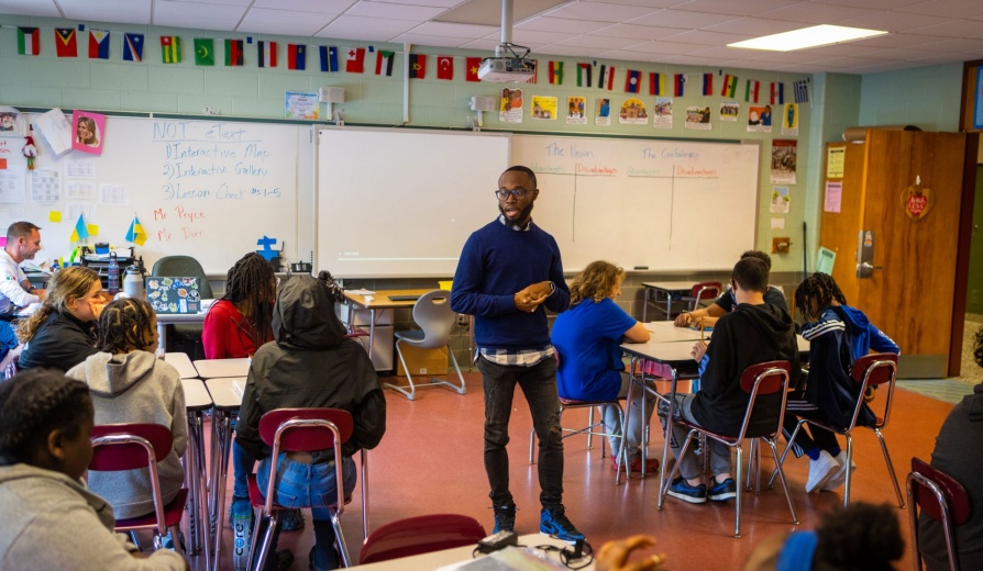 UB Teacher Resident in a classroom of students. 