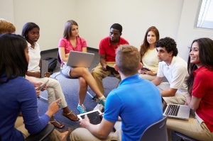 students in a group discussion. 