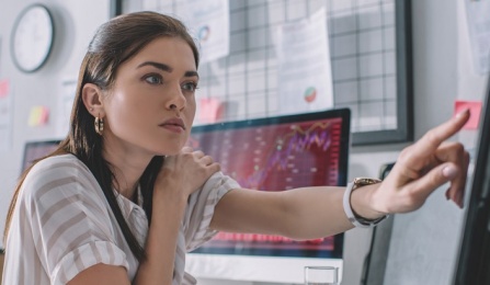 Woman working at a computer. 