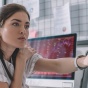 Woman working at a computer. 