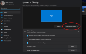 Zoom image: The default is to mirror your laptop screen. Use Windows display settings to use the room screen as an &ldquo;Extended screen&rdquo; instead. 