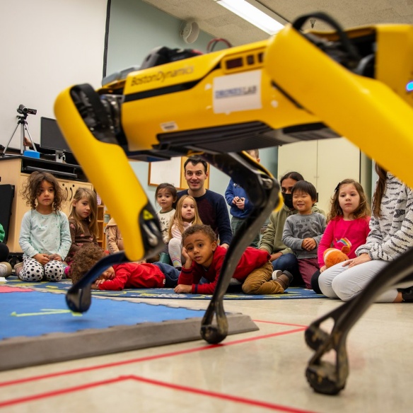 AI robot demonstration with children. 