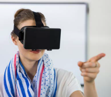 teacher with VR headset on. 