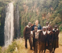 Zoom image: Martin visits Nyahururu, with students from St. Francis Secondary School in Subukia, Kenya, where he started teaching English and history as a volunteer, 1991. (Photo courtesy Rob Martin) 