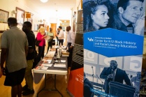 Zoom image: Attendees checking in to the Black History Education conference. 