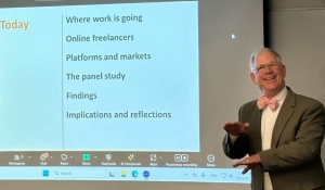 Zoom image: Steven B. Sawyer speaking at UB Department of Information Science Fall Seminar Series event.