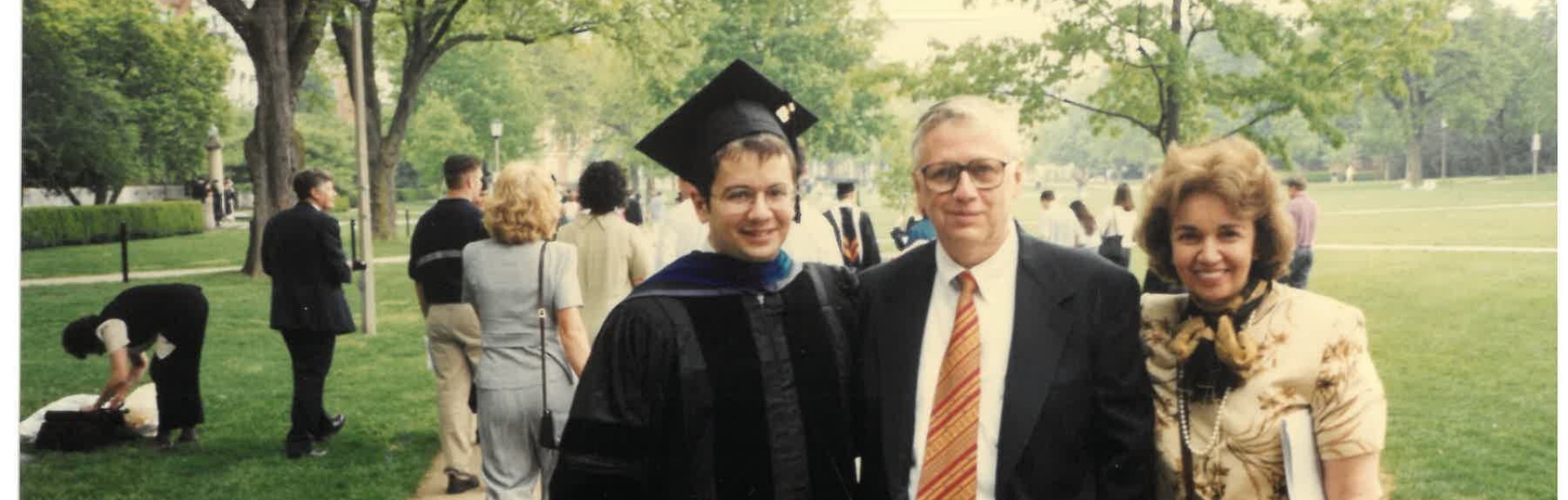 Gregory J. Dimitriadis at graduation with his parents. 