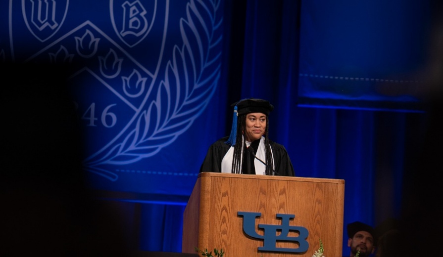 GSE student speaker Courtney Copeland addresses the audience at commencement. 