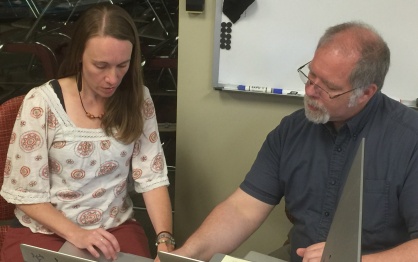 Sunshine R. Sullivan and David L. Bruce at a computer. 