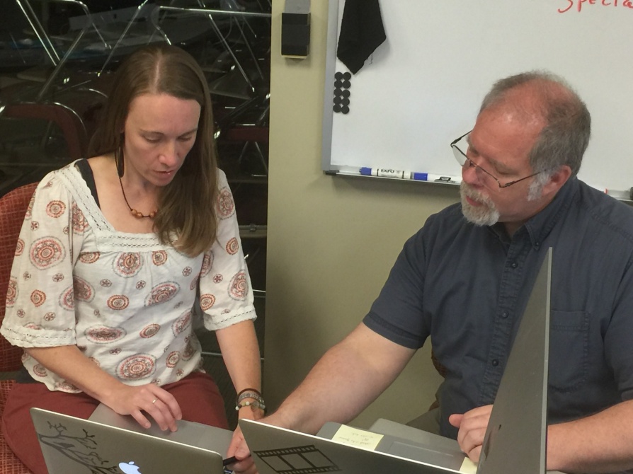 Sunshine R. Sullivan and David L. Bruce at a computer. 