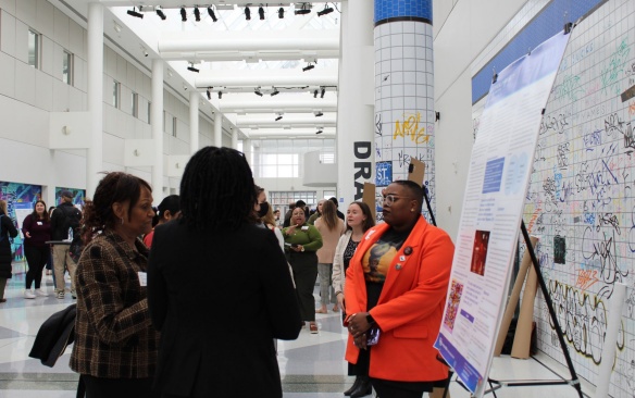 Dawyavyn James at the 2024 Student Research Symposium presenting her poste. 